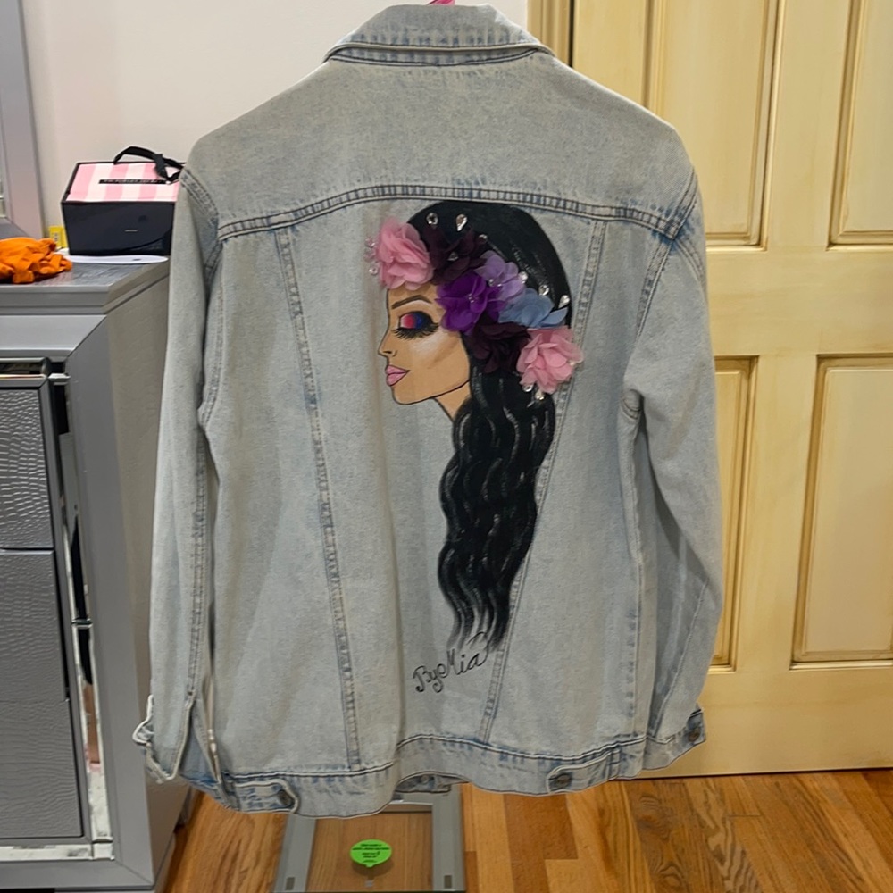 Blue jeans jacket with hand draw Female face